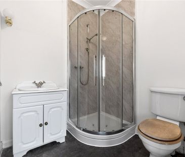 A 4 bedroom detached family home with garage and driveway. - Photo 5