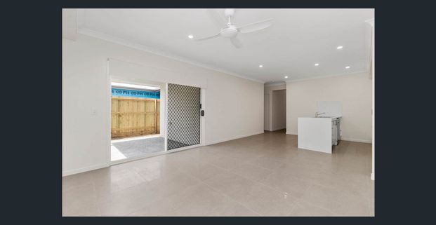 4 BEDROOM HOME WITH OPEN PLAN KITCHEN LIVING THAT OPENS OUT ONTO AN ALFRESCO DINING AREA. AIR CON IN THE MASTER BEDROOM. SECURITY SCREENS ON WINDOWS. - Photo 1