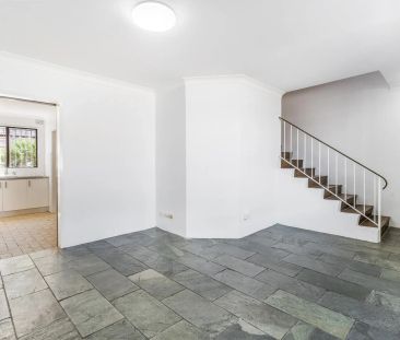 SPACIOUS TOWNHOUSE LIVING - Photo 2