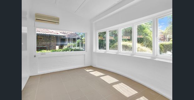 RENOVATED SPACIOUS FAMILY HOME WITH LANDSCAPED GROUNDS - Photo 1