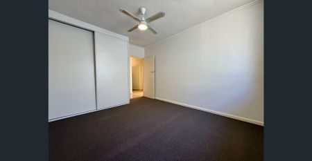 Spacious Family Home with Generous Yards in Prime Location! - Photo 4