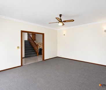 Spacious 4-Bedroom Home with Versatile Living - Photo 1