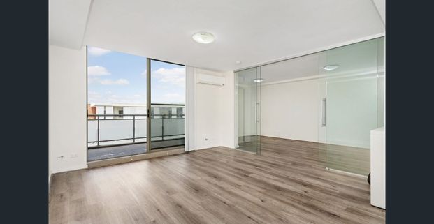 Modern Two-Bedroom Apartment with Additional Family Room - Photo 1