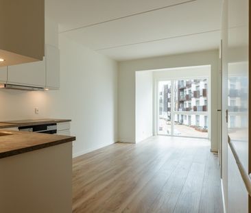 Nyopført 2-værelses lejlighed i flot og moderne boligkompleks - Foto 6