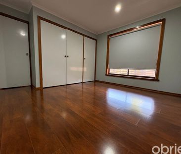 Freshly Painted 3 Bedroom Unit in Convenient Location - Photo 3