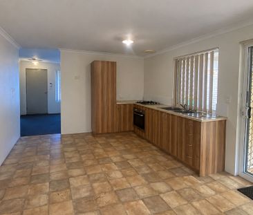 Neat 4-Bedroom Home with Monthly Lawn Mowing Included - Photo 5