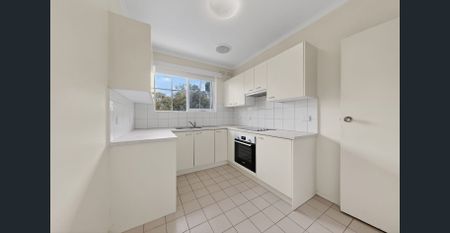 Neat and Tidy 2 Bedroom - Photo 5