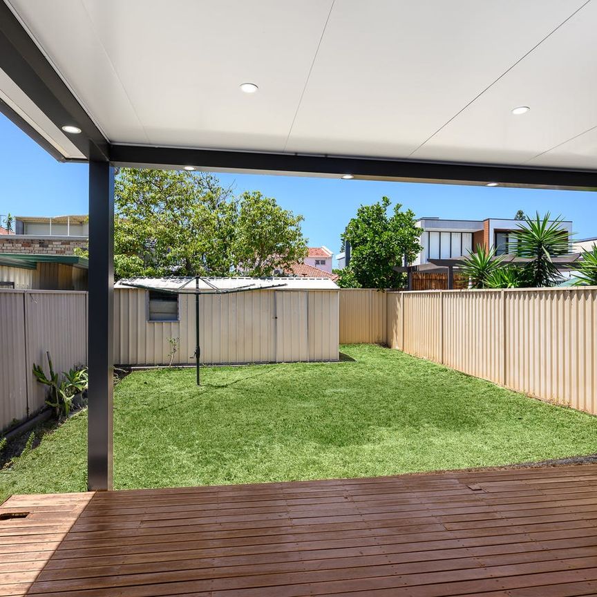 Stylish Entertainer's Duplex in a Lifestyle Location - Photo 1