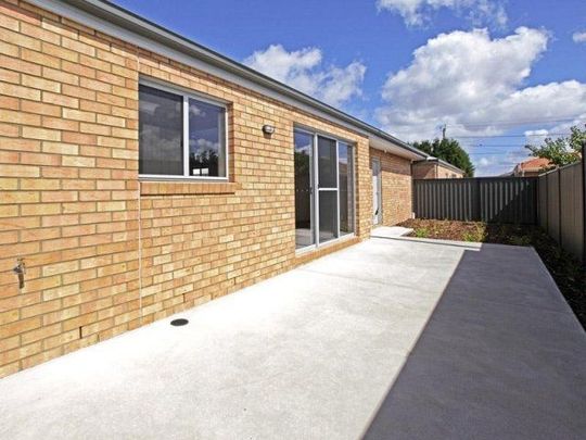 THREE BEDROOM UNIT IN QUIET COURT - Photo 1