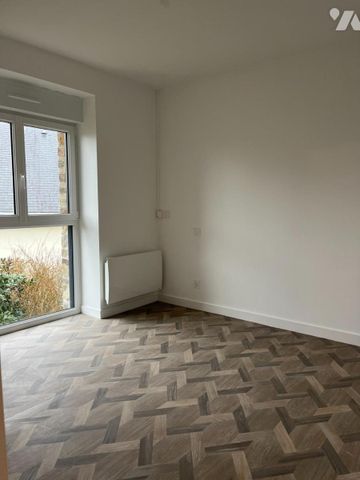 Duplex avec jardin refait à neuf au coeur de l'Huisserie , à proximité de toutes les commodités - Photo 3