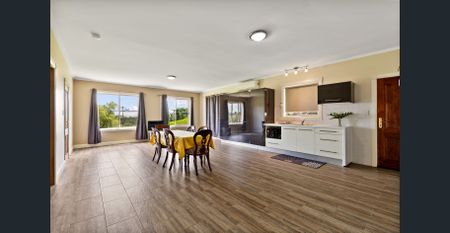 Impressive 4-Bedroom Home with In-Law Accommodation & Huge Storage - Photo 3