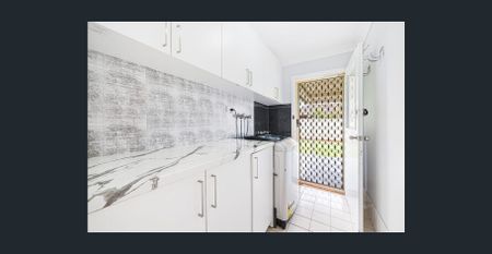 Perfect Family Living with Ducted Air Conditioning - Photo 3