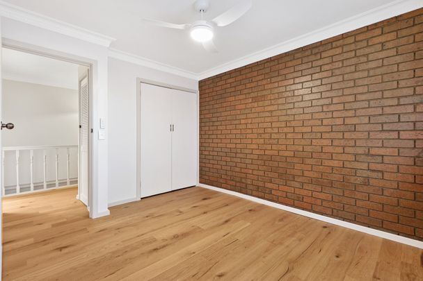 Renovated 2-Bedroom Townhouse in Prime Coburg Location - Photo 1