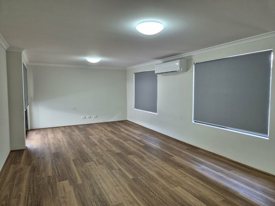 Low-Maintenance Family Home - Photo 1