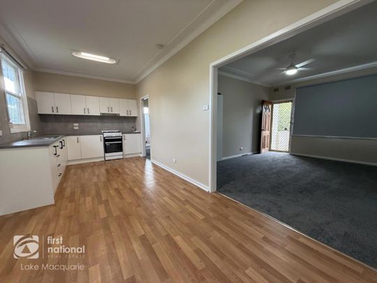 Stylish Renovated Home with Entertaining Deck & Huge Backyard - Photo 1