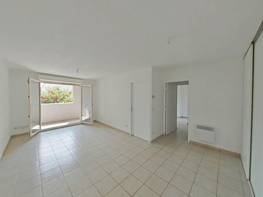 Location Appartement 2 pièces 47m² ROMANS SUR ISERE 26100 - Photo 1