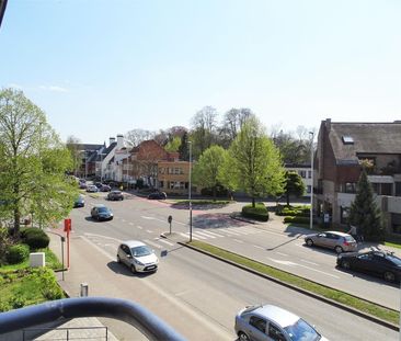 Centraal gelegen appartement met terras en autostaanplaats - Photo 4