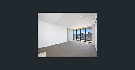 2 BEDROOM SPLIT LEVEL APARTMENT WITH PARKING NEXT DOOR TO EAST VILLAGE SHOPPING CENTRE! - Photo 4