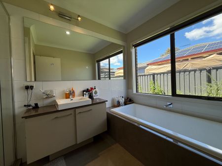 Spacious 4-Bedroom Home with Two Living Areas and Modern Upgrades - Photo 4