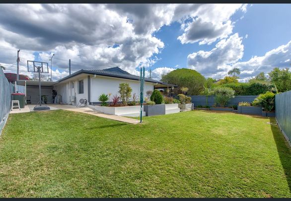 Four- Bedroom Home in Prime Location - Photo 1