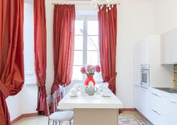 Center-Historic Jewish Quarter: Elegant apartment situated in beautiful Palazzo Nobiliare. Entrance, spacious living with original wood frescoed ceilings, large modern dining and kitchen, 4 bedrooms, 4 Baths, small terrace. #1527