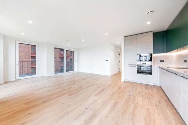 Step into the allure of this stunning two-bedroom, two-bathroom apartment, ideally situated within Barnacle House at Berkeley Homes' exciting new Heron Wharf development. - Photo 1