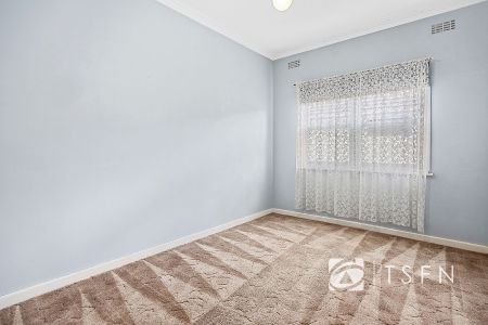 Charming Three-Bedroom Home with Shed and Side Access - Photo 4