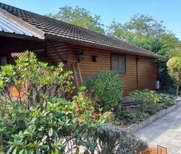 Bungalow met 1 slpk en ruime tuin (10 are) - Photo 2