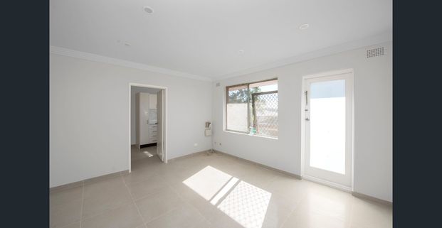 Modern Unit in a Highly Sought After Location - Photo 1