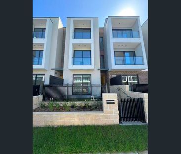 Spacious Three-Level Townhouse with Workshop & Dual Outdoor Living - Photo 6