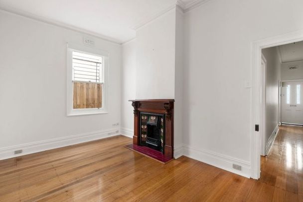 Stylish, Low-Maintenance Living in a Prime Location - Photo 1