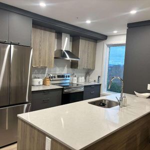 ✨ 3 ½ moderne, dernier étage, très lumineux – Wi-Fi & stationnement intérieur inclus ! - Photo 2