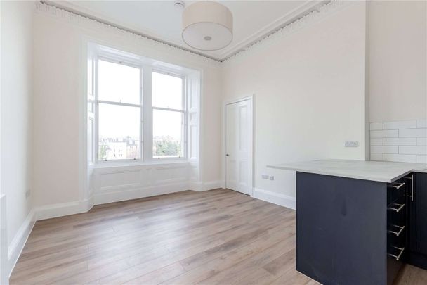 A bright and modern second floor two bedroom flat available on a part-furnished basis in Morningside. - Photo 1