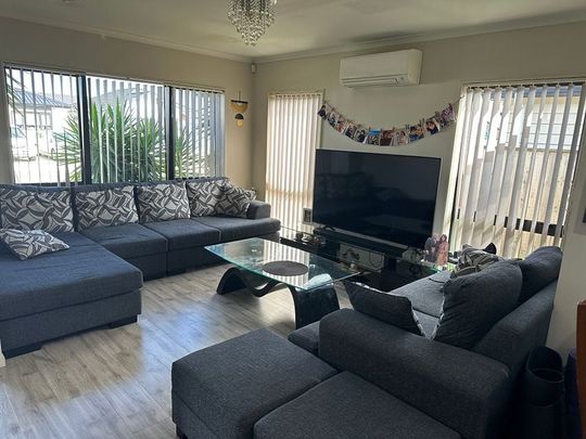Charming 4BR Family Home in TwinParkRisePapakura - Photo 1