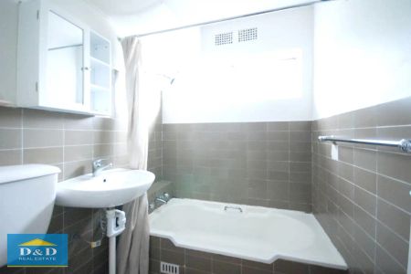 “Bright 2 Bedroom Unit Overlooking Parramatta Park in CBD. Fantastic Kitchen. 5 Minute Walk To Station & Westfield Shopping. Undercover Car space” - Photo 4