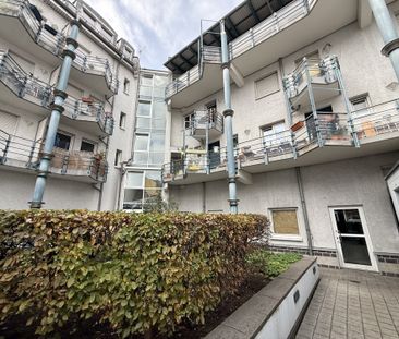 Hübsche 1 Zi.-Wohnung, teilmöbliert, nur wenige Gehminuten vom Haup... - Foto 1