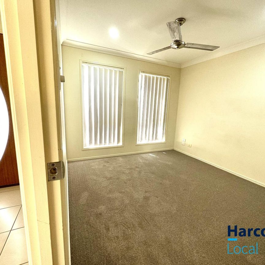 FOUR BEDROOM FAMILY HOME IN UPPER COOMERA - Photo 1