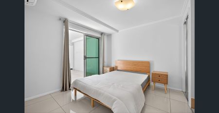 2 Bedroom Unit with Extra Sunroom, Large Balcony and Huge Grassed Backyard - Photo 4