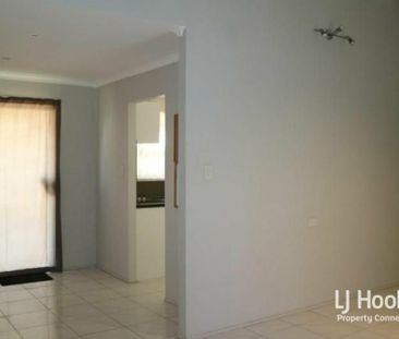 SPACIOUS THREE-BEDROOM HOME WITH AIR CONDITIONING & SIDE ACCESS - Photo 6
