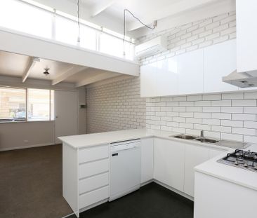 A newly renovated 1-bedroom unit - Photo 4