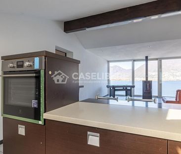 INCANTEVOLE ATTICO CON VISTA LAGO A PIAZZOGNA - Foto 2