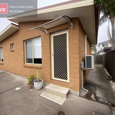 Home Sweet Home! - NO LAWNS TO MAINTAIN, 2 DRIVEWAY CAR SPACES, 2 TOILETS - Photo 4