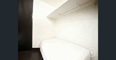 Stylish Furnished City Apartment with Study in an Unbeatable CBD Location - Photo 5