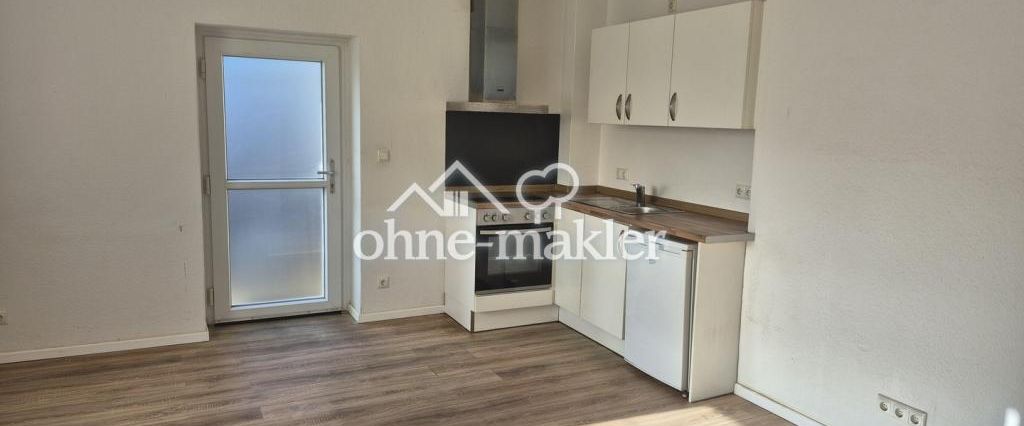 1,5 Zi.-Hochparterre-Wohnung mit Küche, ruhig gelegen im Grünen - Foto 1