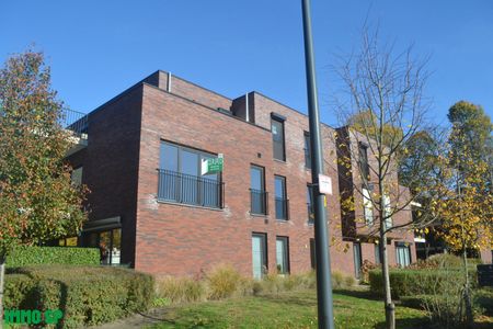 Centraal gelegen recent, lichtrijk appartement met 2 slaapkamers - Photo 3