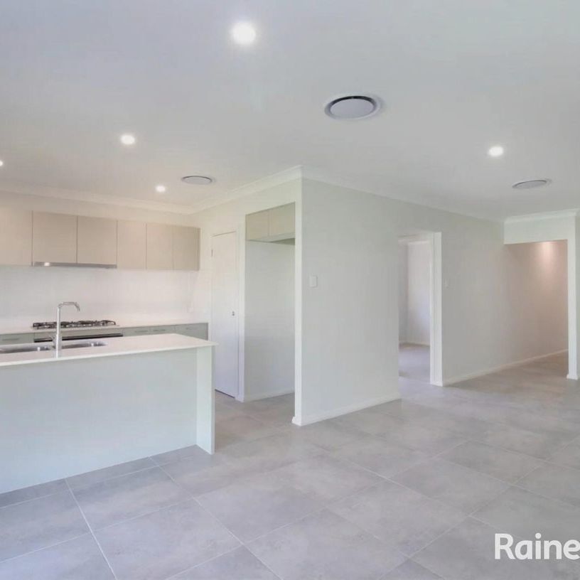 Modern Family Living in a Peaceful Estate - Photo 1