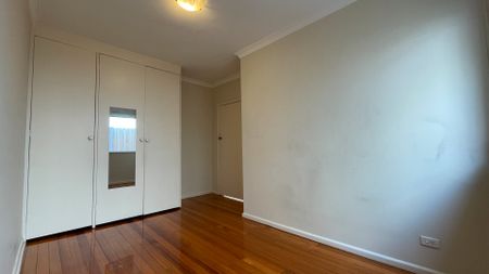 Bright 2-Bedroom Unit with Private Courtyard, Carport & Storeroom - Photo 2