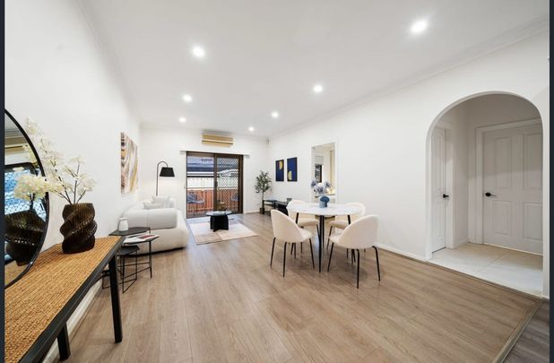 Front 2 Bedroom Villa with Lock up Garage - Photo 1