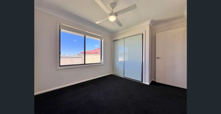 NEAR NEW 4 BEDROOM HOME - Photo 4