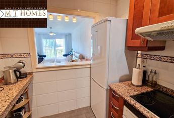 FULLY FURNISHED FRONTLINE GOLF APARTMENT WITH LARGE TERRACE BEAUTIFUL VIEWS - POOL AND A GARAGE